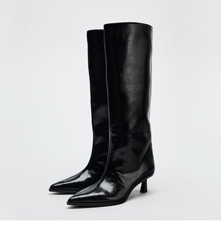 Pointed knee-high boots