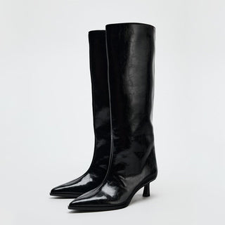 Pointed knee-high boots