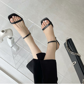 High-heeled strappy sandals