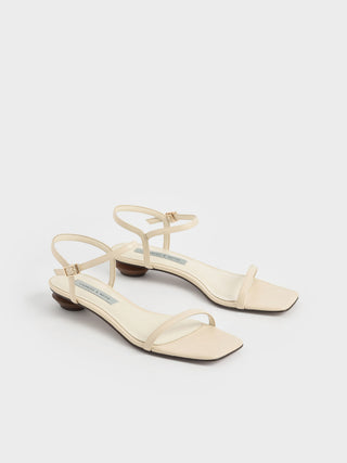 One-strap low-heeled sandals