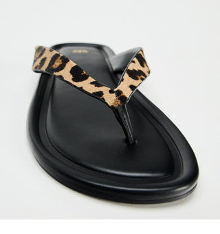 Leopard print flat flip flops