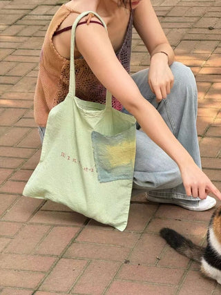 small pleated underarm canvas bag