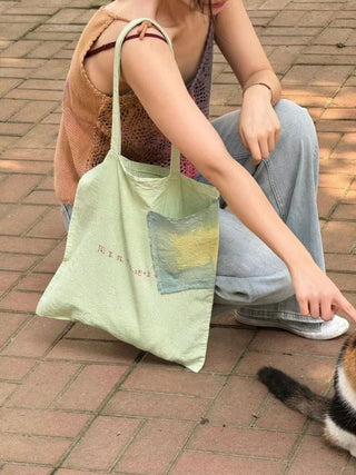 small pleated underarm canvas bag