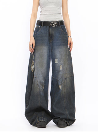 Dirty-dyed wide-leg ripped jeans