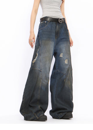 Dirty-dyed wide-leg ripped jeans