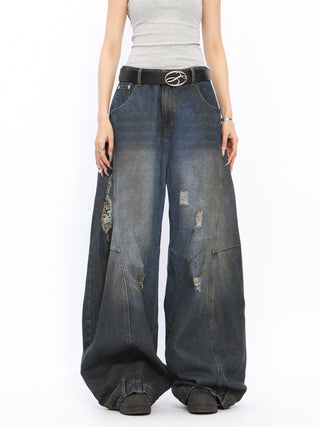 Dirty-dyed wide-leg ripped jeans