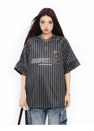 Vertical striped football top