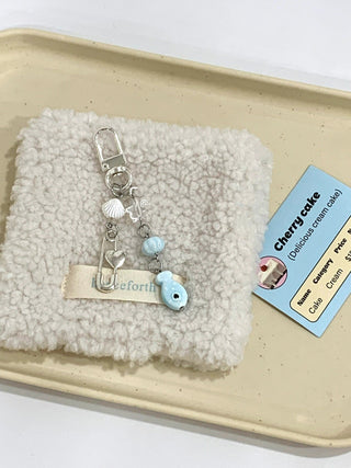 Cute fish and shells charm