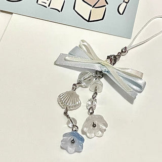 Bow sea shell charm