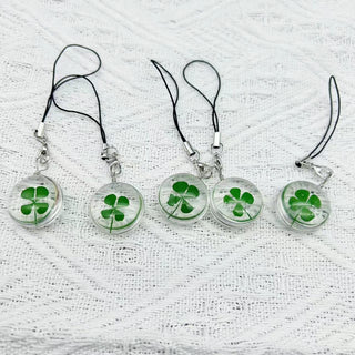 Transparent four leaf clover charm