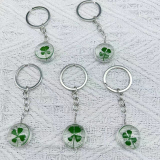 Transparent four leaf clover charm