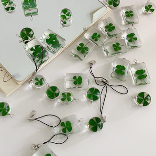 Transparent four leaf clover charm