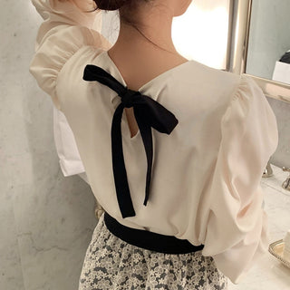 Two-way bow polka dot top