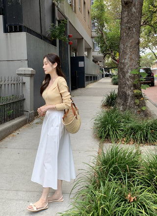 V-neck sweater and high waist pleated skirt set