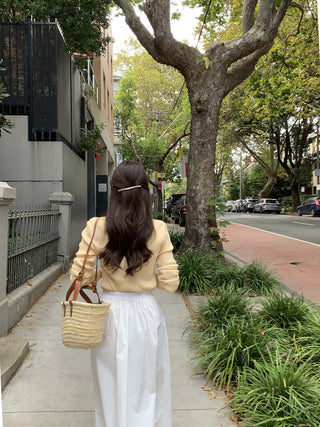 V-neck sweater and high waist pleated skirt set