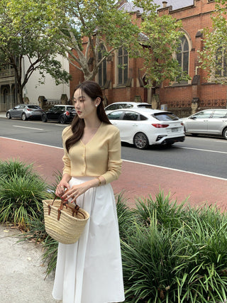 V-neck sweater and high waist pleated skirt set