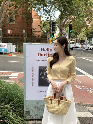 V-neck sweater and high waist pleated skirt set