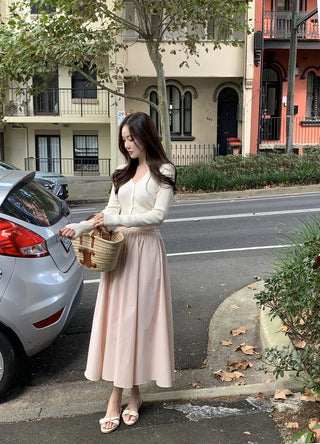 V-neck sweater and high waist pleated skirt set