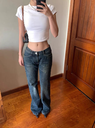 Dark blue mid-low waist flared jeans