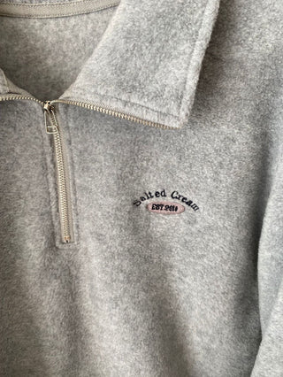 Embroidered quarter zip fleece sweatshirt