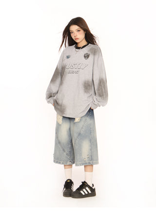 Distressed oversized sporty top