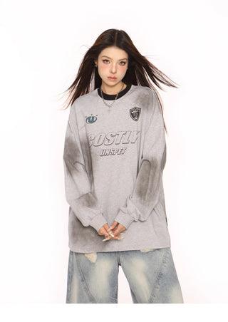 Distressed oversized sporty top