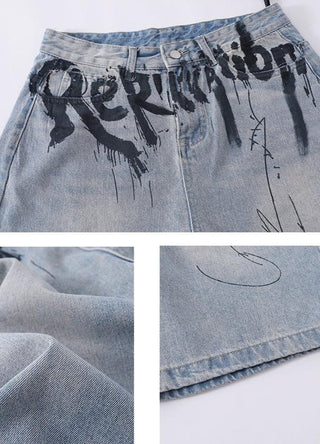 Ink-sprayed graphic jorts