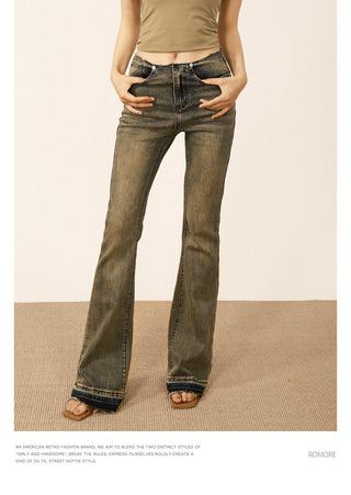 Distressed flared jeans