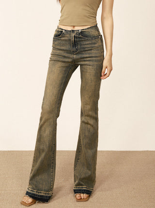 Distressed flared jeans