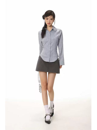 Blue slim-fit striped shirt and high waist a-line skirt