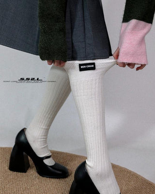 Long calf over the knee mid-tube socks