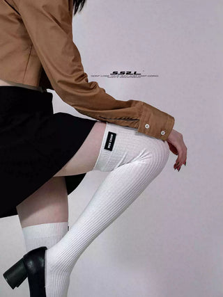 Long calf over the knee mid-tube socks