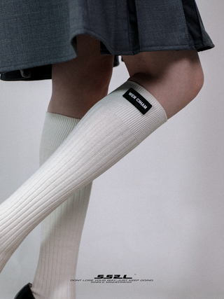 Long calf over the knee mid-tube socks