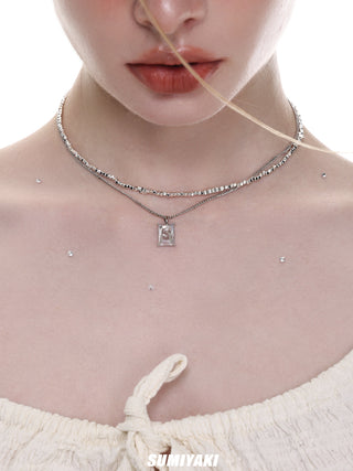 Double-layered clavicle chain pendant