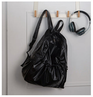 Drawstring fold backpacks