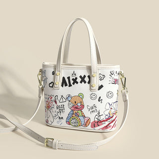 Graffiti graphic cross-handed bag