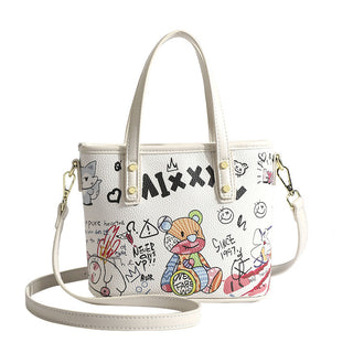 Graffiti graphic cross-handed bag