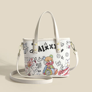 Graffiti graphic cross-handed bag