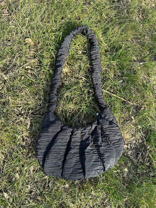 Rippled cross body bag