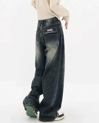 DISTRESSED LOOSE FIT JEANS