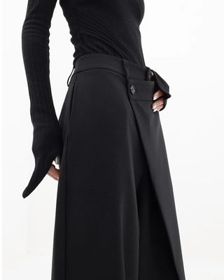 ASYMMETRICAL CROSS PANEL TROUSERS